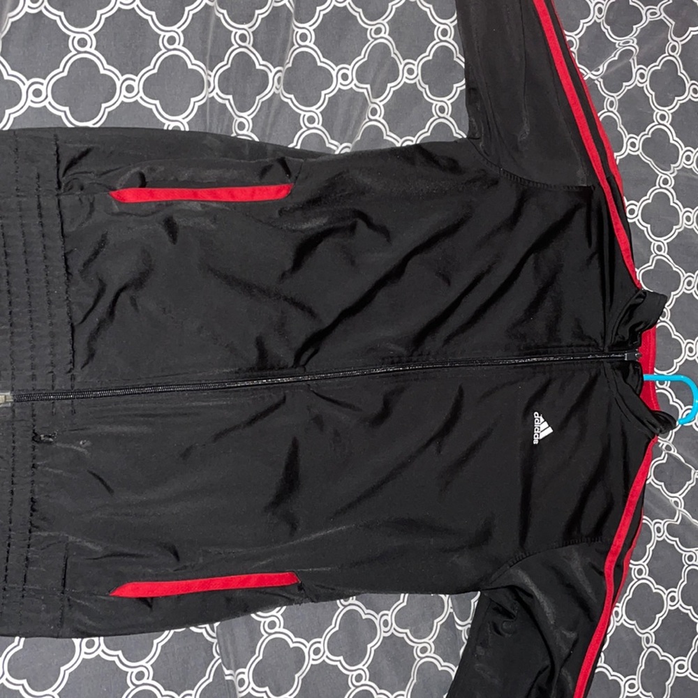 Adidas red and black sweater.